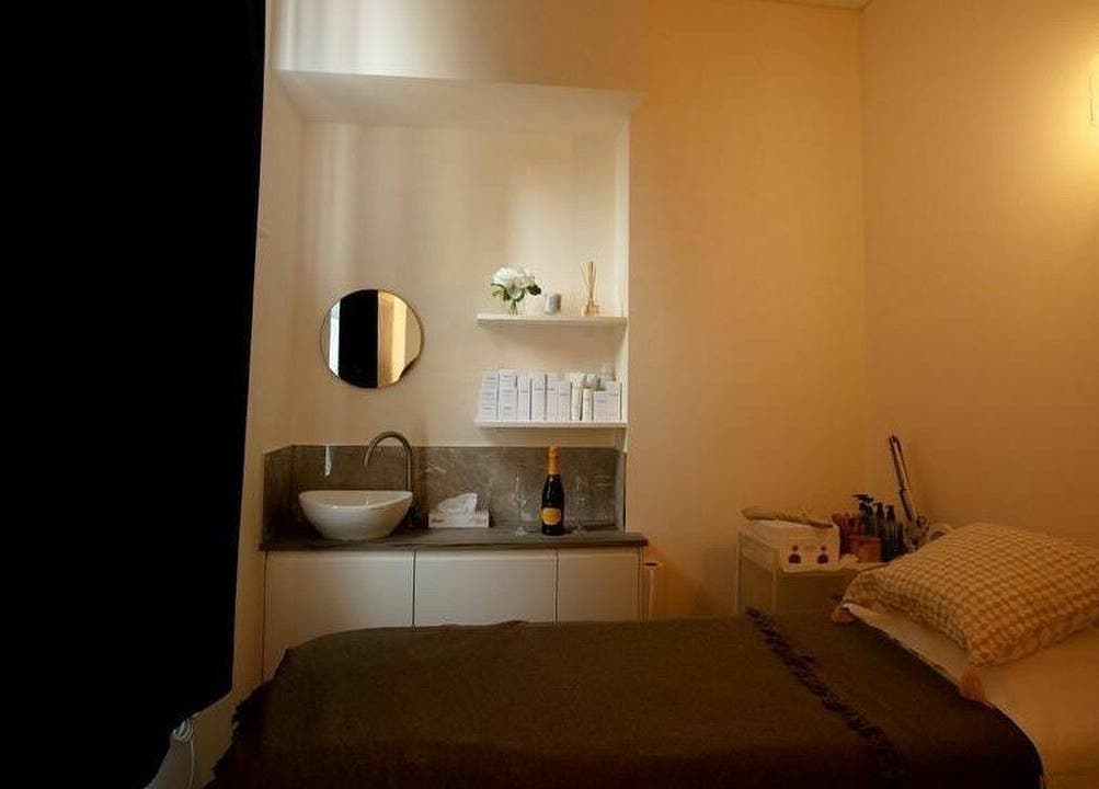 Cozy treatment room at D'lux Nails and Beauty Salon in London, England, GB, featuring a stylish sink and decor.