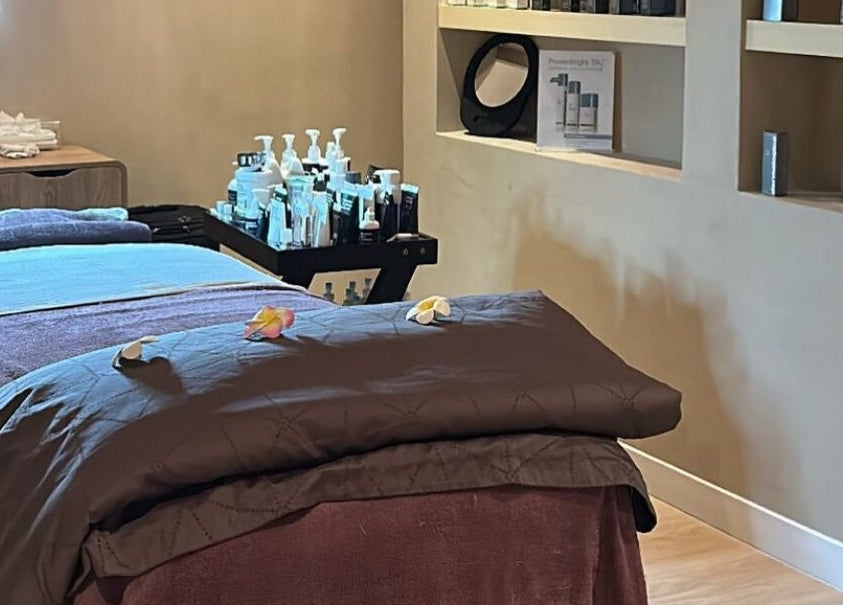 Massage room at She Spa Al Ain, العين, أبو ظبي, AE, featuring a cozy massage table and serene ambiance.