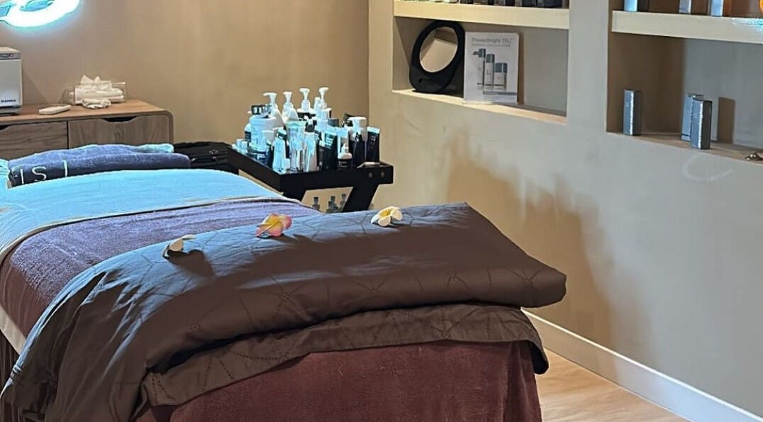 Massage room at She Spa Al Ain, العين, أبو ظبي, AE, featuring a cozy massage table and serene ambiance.