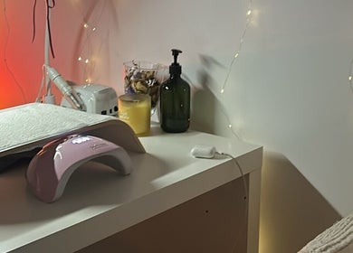 Cozy nail station at Allure Nails in North Lakes, Queensland, AU with ambient lighting and sleek tools.