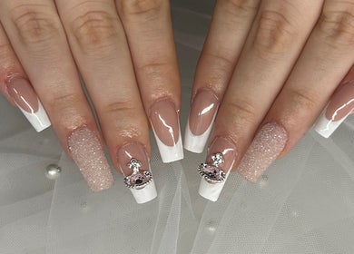 French manicure with glitter accents at Allure Nails, North Lakes, Queensland, AU.