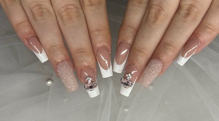 French manicure with glitter accents at Allure Nails, North Lakes, Queensland, AU.