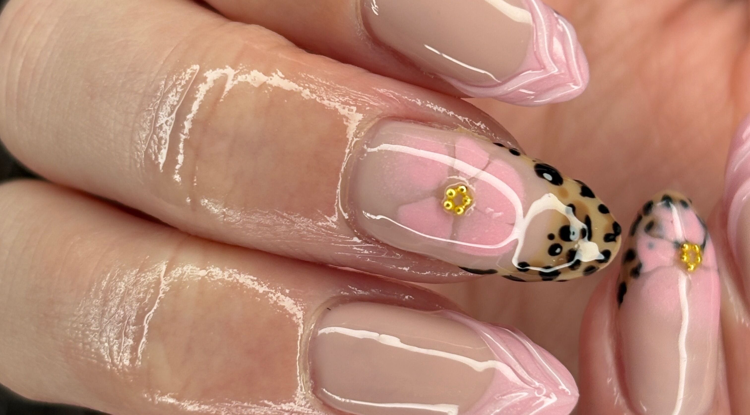 Manicure with floral nail art at Allure Nails, North Lakes, Queensland, AU.