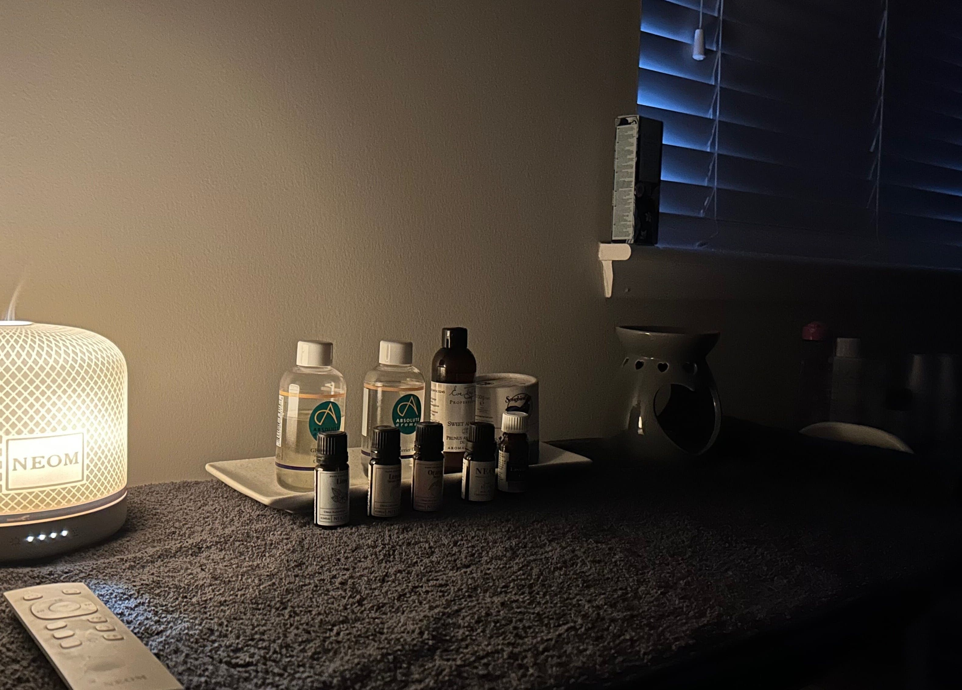 Aromatherapy oils and diffuser at Beauty By Dennon, West Calder, Scotland, GB create a calming ambiance.