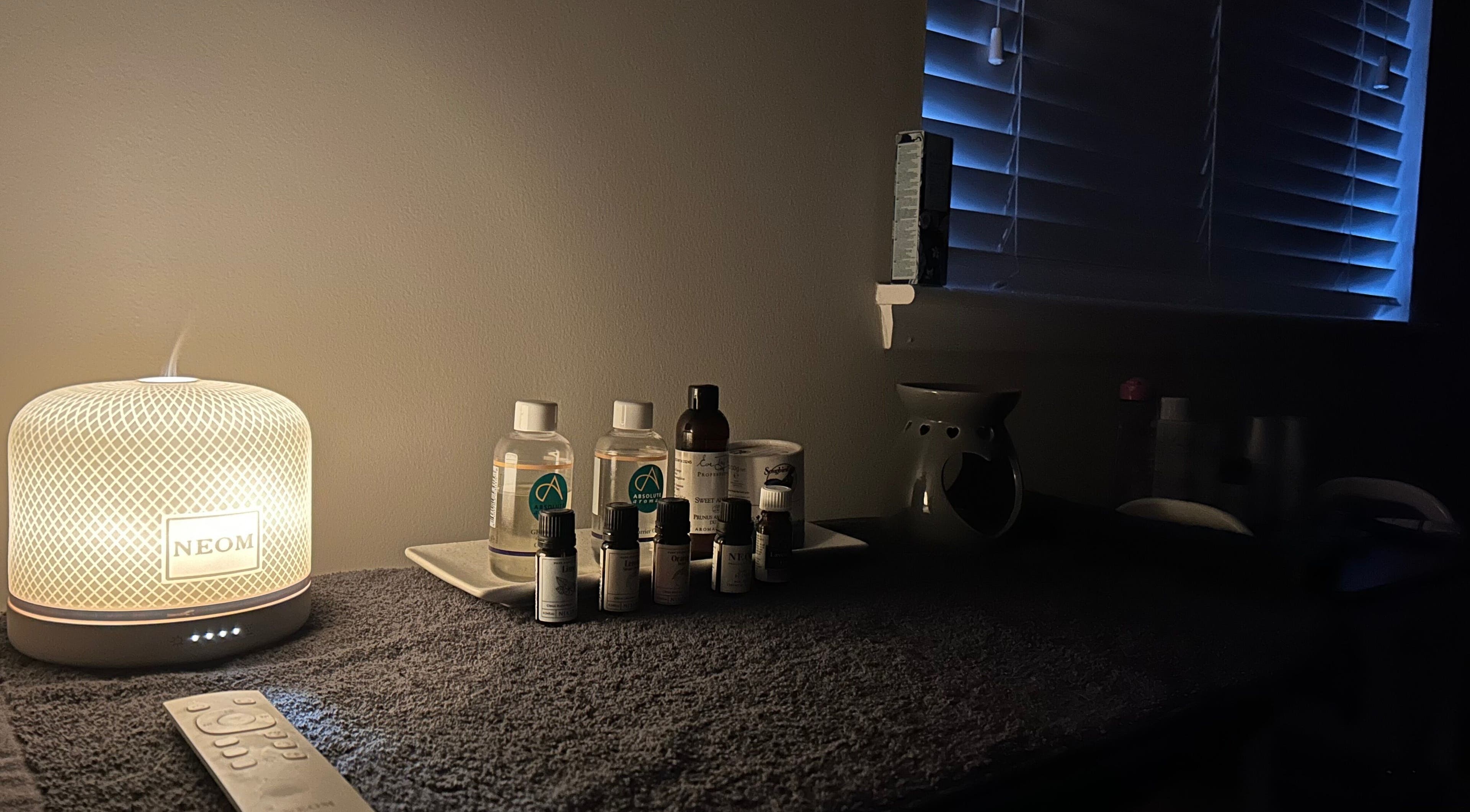 Aromatherapy oils and diffuser at Beauty By Dennon, West Calder, Scotland, GB create a calming ambiance.