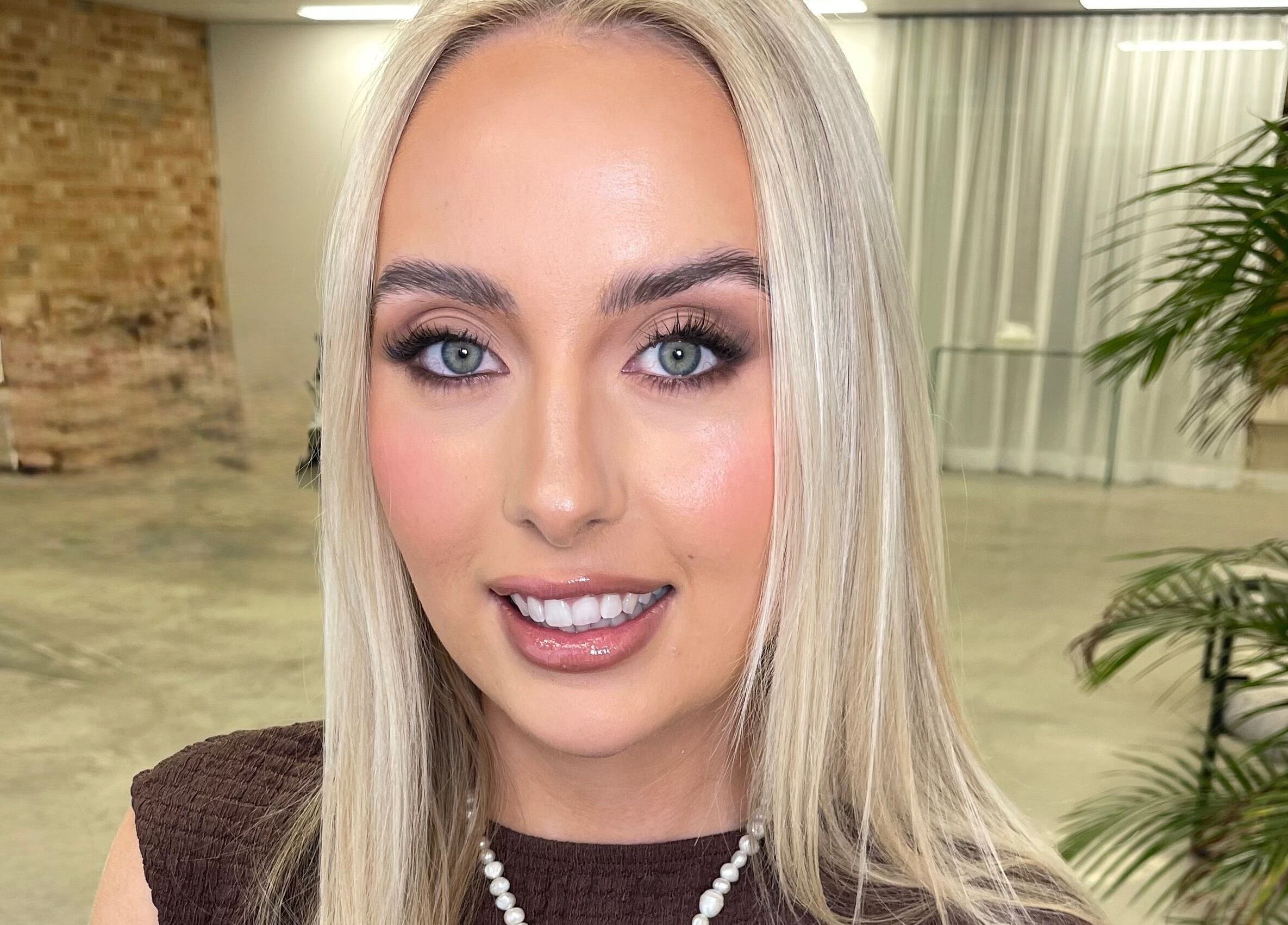 Woman with flawless makeup at Pamela Nolan Makeup - Her Place Cosmetics, Banksmeadow, New South Wales, AU.