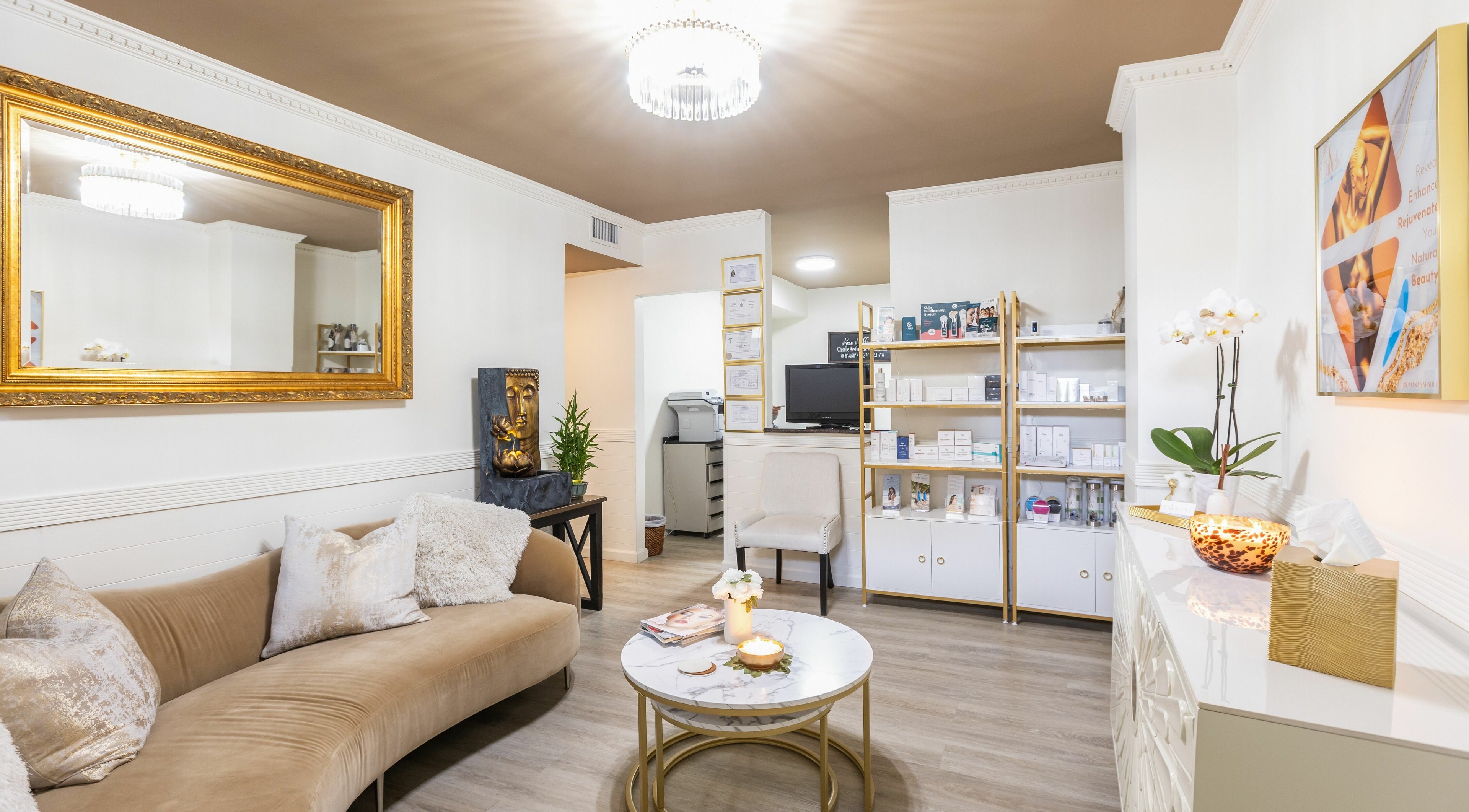 Elegant waiting area of Chiselle Aesthetic & Wellness, New York, New York, US with plush seating and decor.