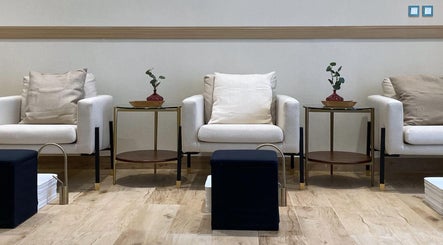 Elegant waiting area with plush seating at Al-Kheesa Branch, Doha, Al Daayen, QA.