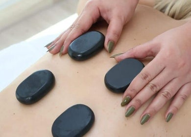 Hot stone massage at Izghawa Branch, الريان, الريان, QA enhances relaxation and wellness.