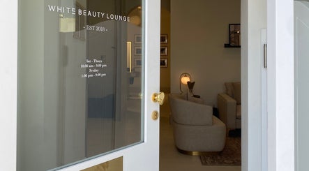 Entrance of Al-Kheesa Branch in Doha, Al Daayen, QA, showcasing elegant lounge interiors.