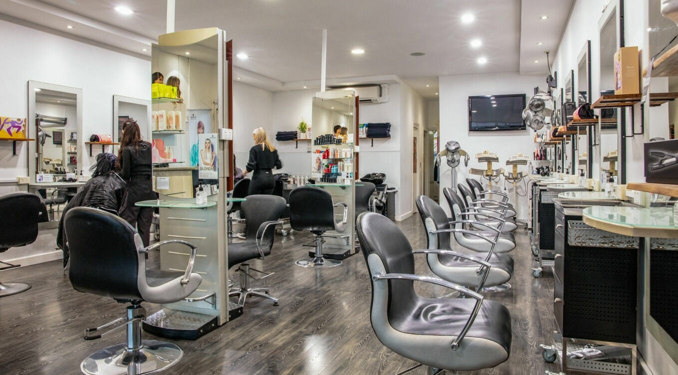 Inside Maddness Hair Design salon in Bundoora, Victoria, AU with modern styling stations.