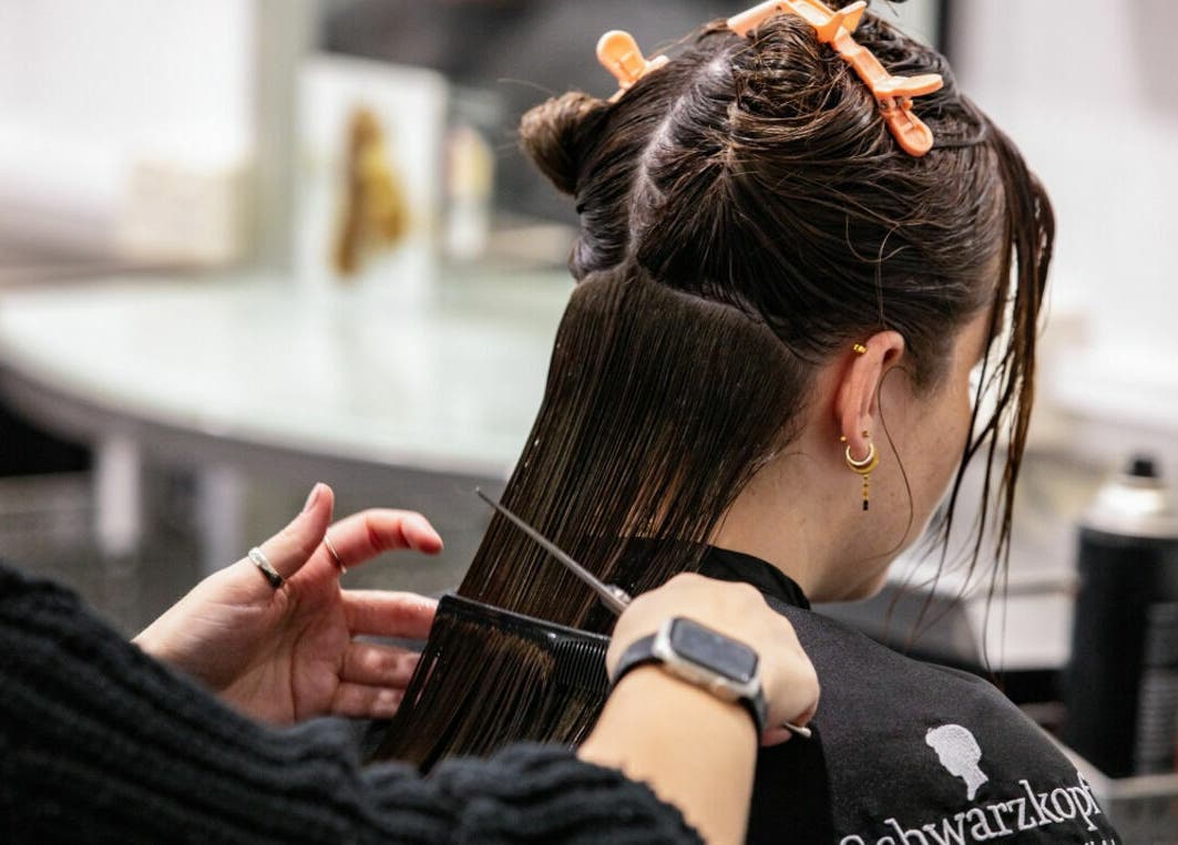 Haircut in progress at Maddness Hair Design, Bundoora, Victoria, AU, showcasing expert precision.