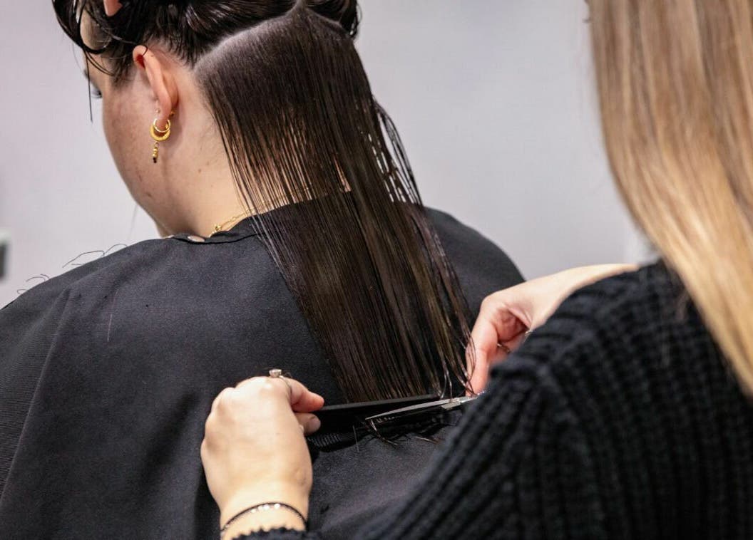 Stylish haircut in progress at Maddness Hair Design, Bundoora, Victoria, AU.