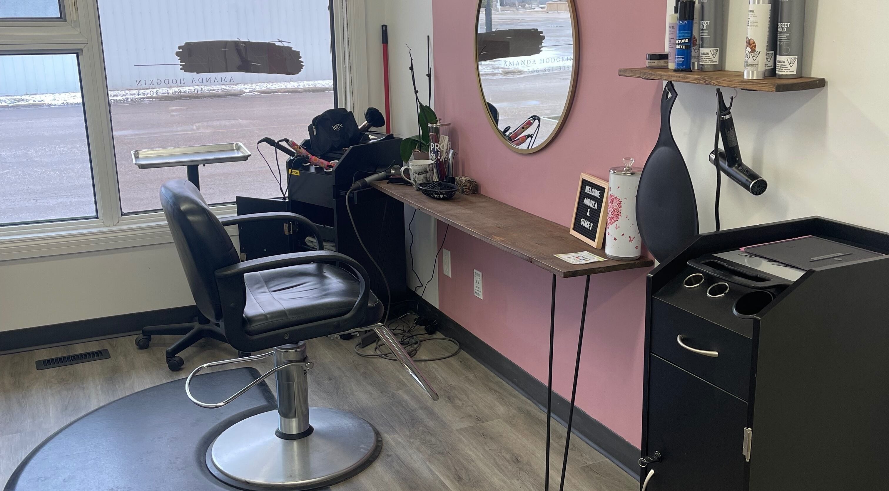 Modern hair salon chair and styling station at Stacey Pederson at The Hair Shop, Weyburn, Saskatchewan, CA.