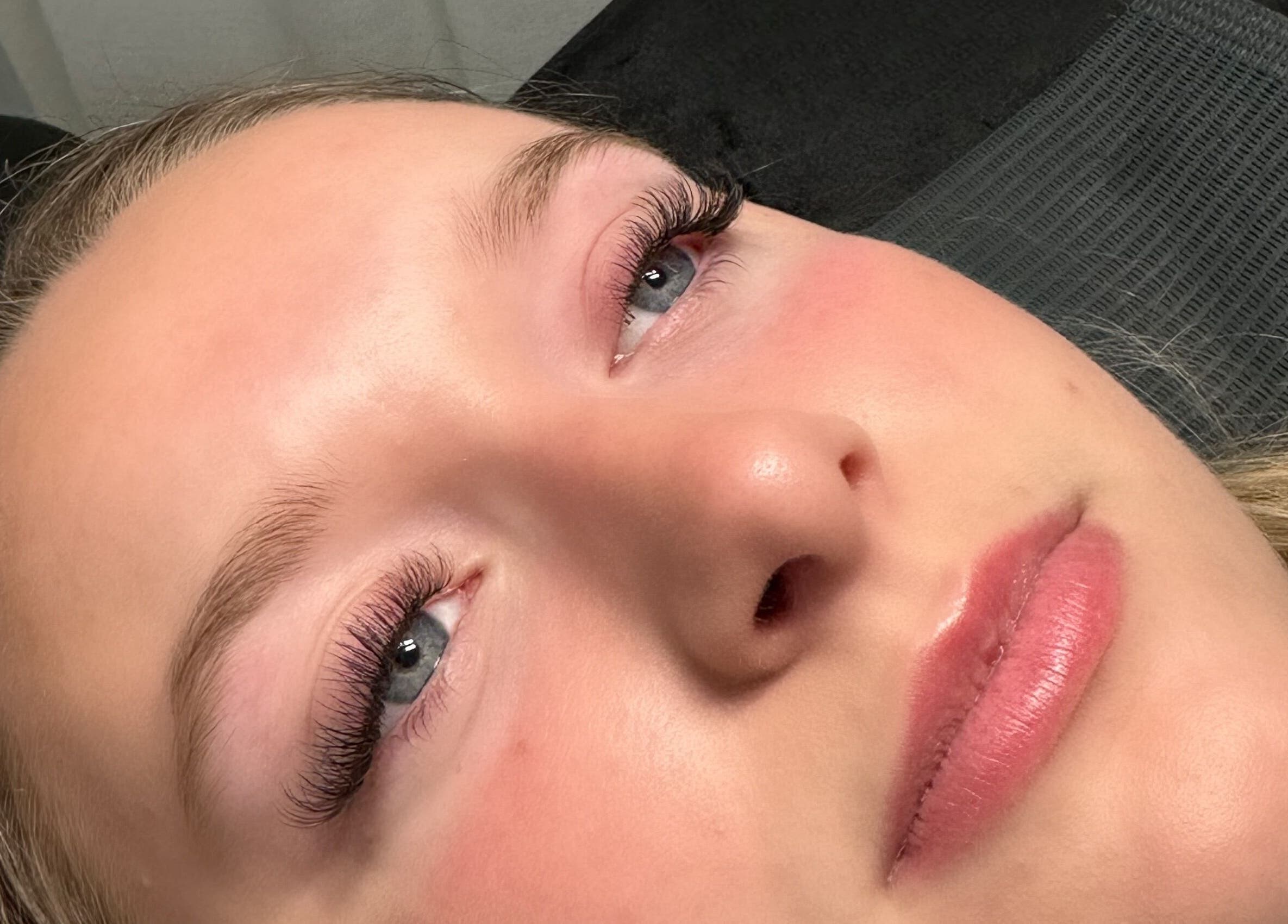 Close-up of woman with stunning eyelashes at Lab Lounge, Blacksmiths, New South Wales, AU.