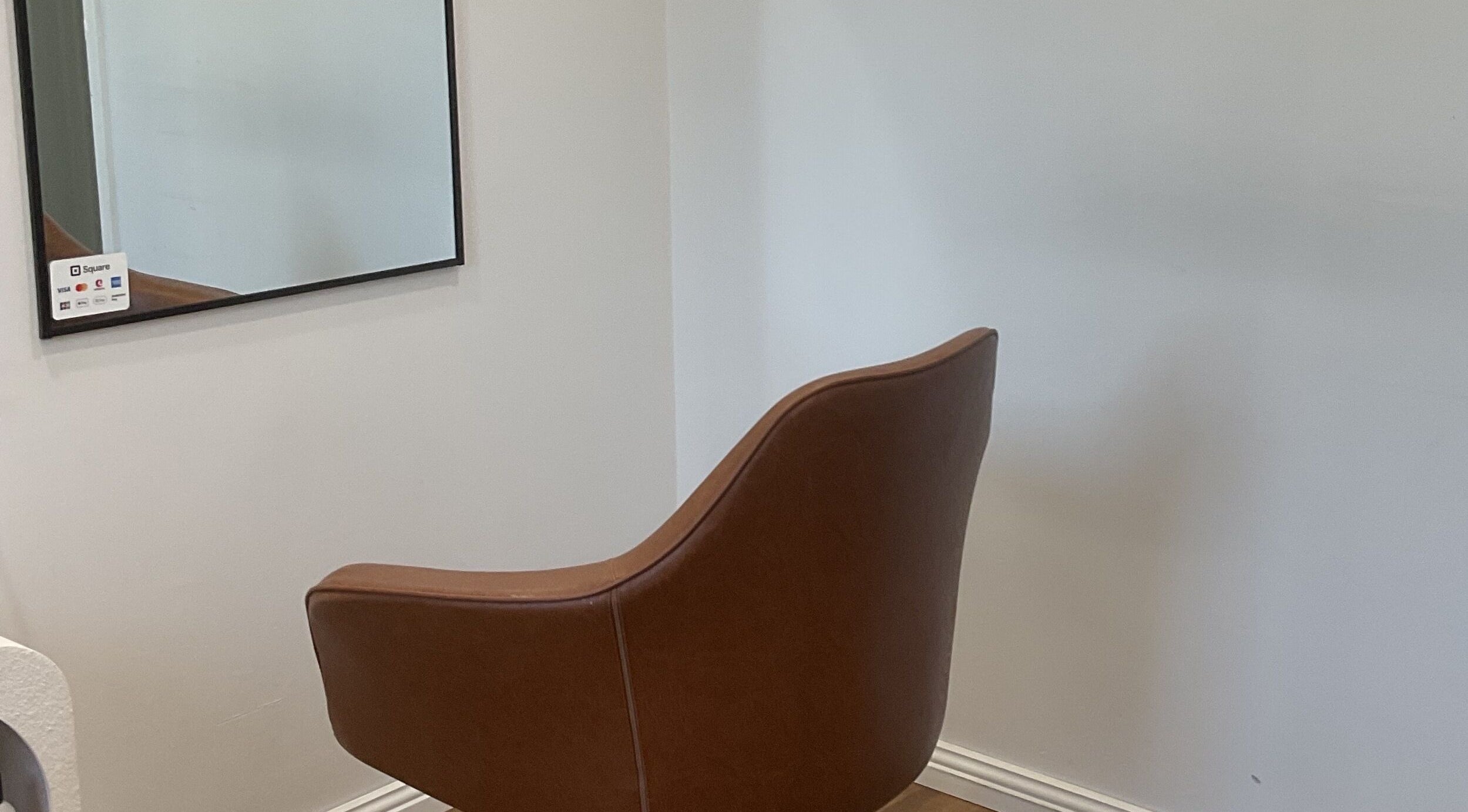 Elegant styling chair at Blossom Hair Artistry, Quinns Rocks, Western Australia, AU, offering a stylish, serene experience.