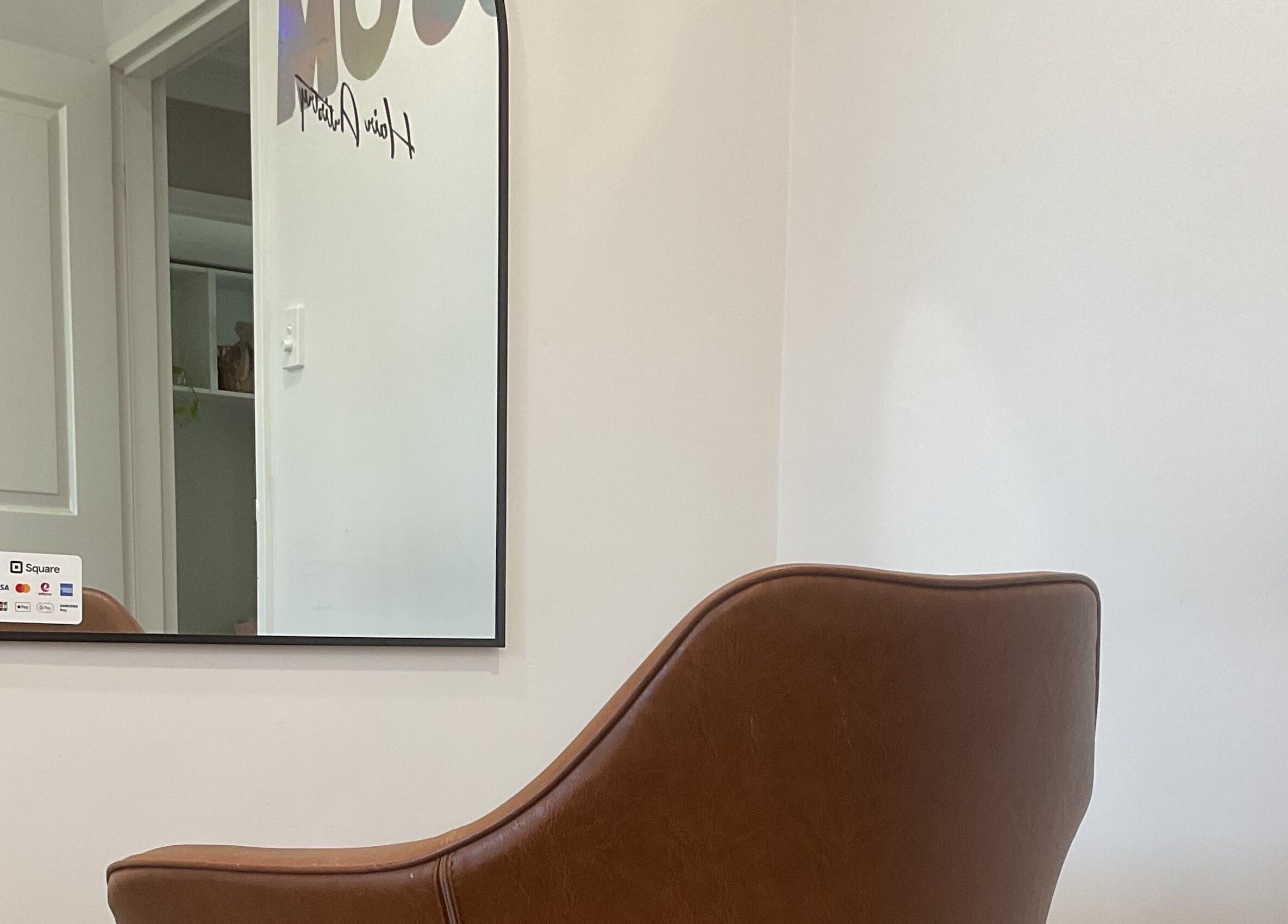 Comfortable salon chair in Blossom Hair Artistry, Quinns Rocks, Western Australia, AU, reflecting a modern aesthetic.