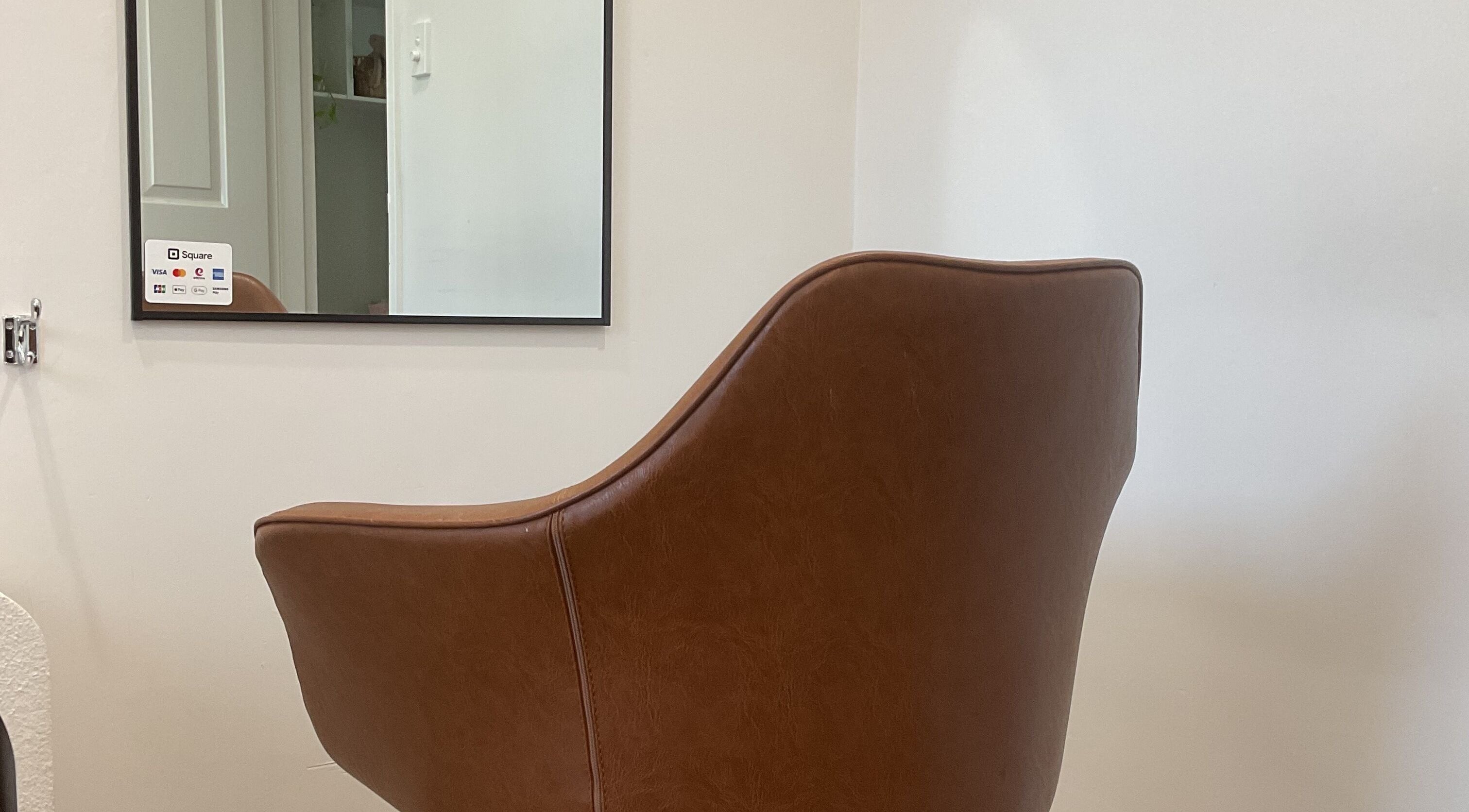 Luxurious salon chair at Blossom Hair Artistry, Quinns Rocks, Western Australia, AU, enhancing beauty experiences.