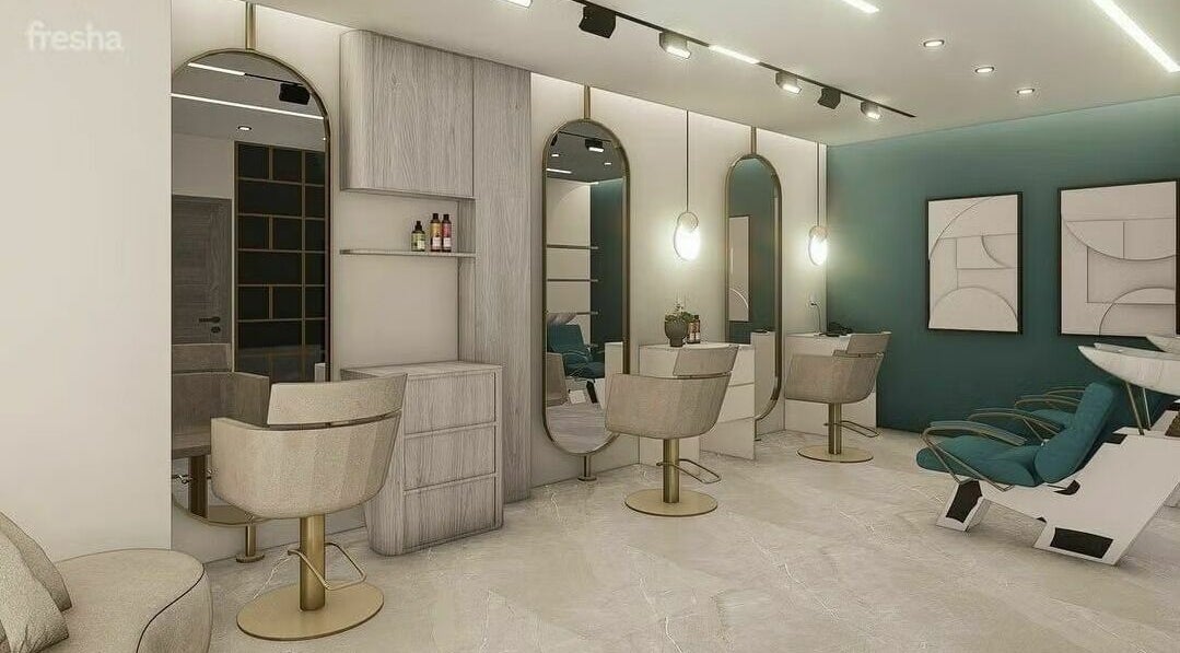 Modern salon interior at Leen Beauty Center, Aqaba, Aqaba Governorate, JO, featuring chic mirrors and seating.