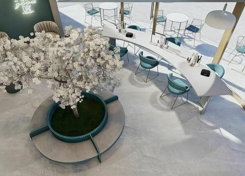 Chic interior of Leen Beauty Center, Aqaba. Modern seating and decor under soft lighting.