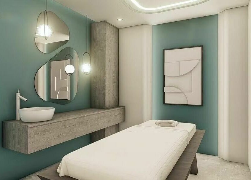 Tranquil massage room at Leen Beauty Center in Aqaba, Aqaba Governorate, JO, featuring modern minimalist design.