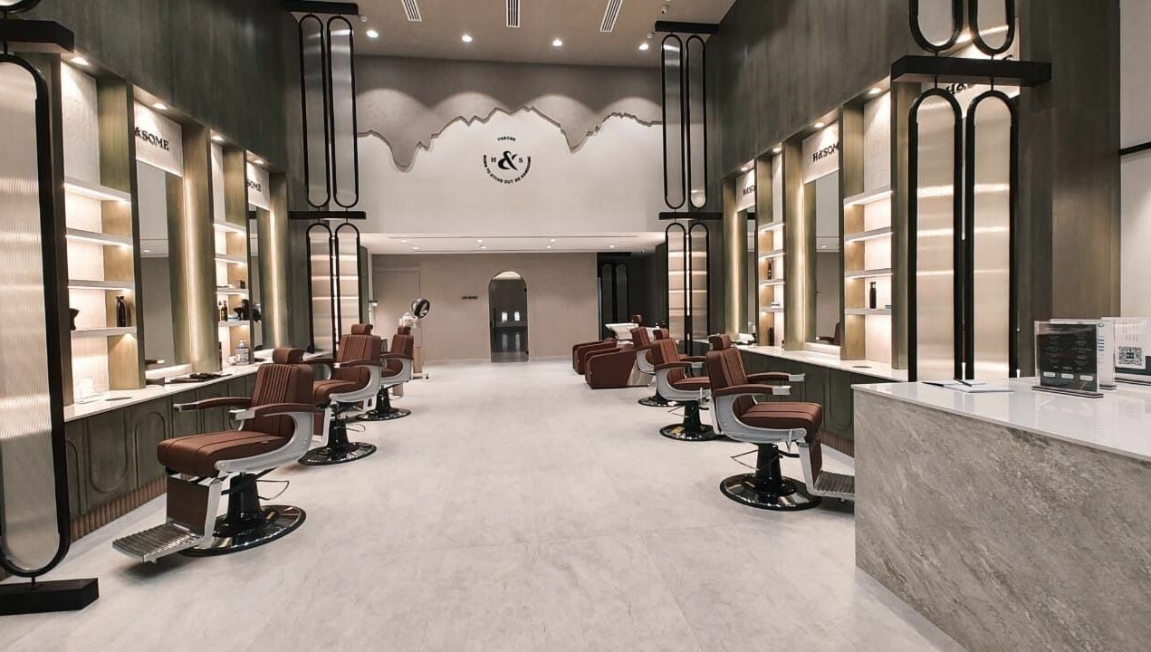 Stylish interior of Handsome - هاندسم salon in Riyadh, Riyadh Province, SA showcasing modern design and luxury seats.