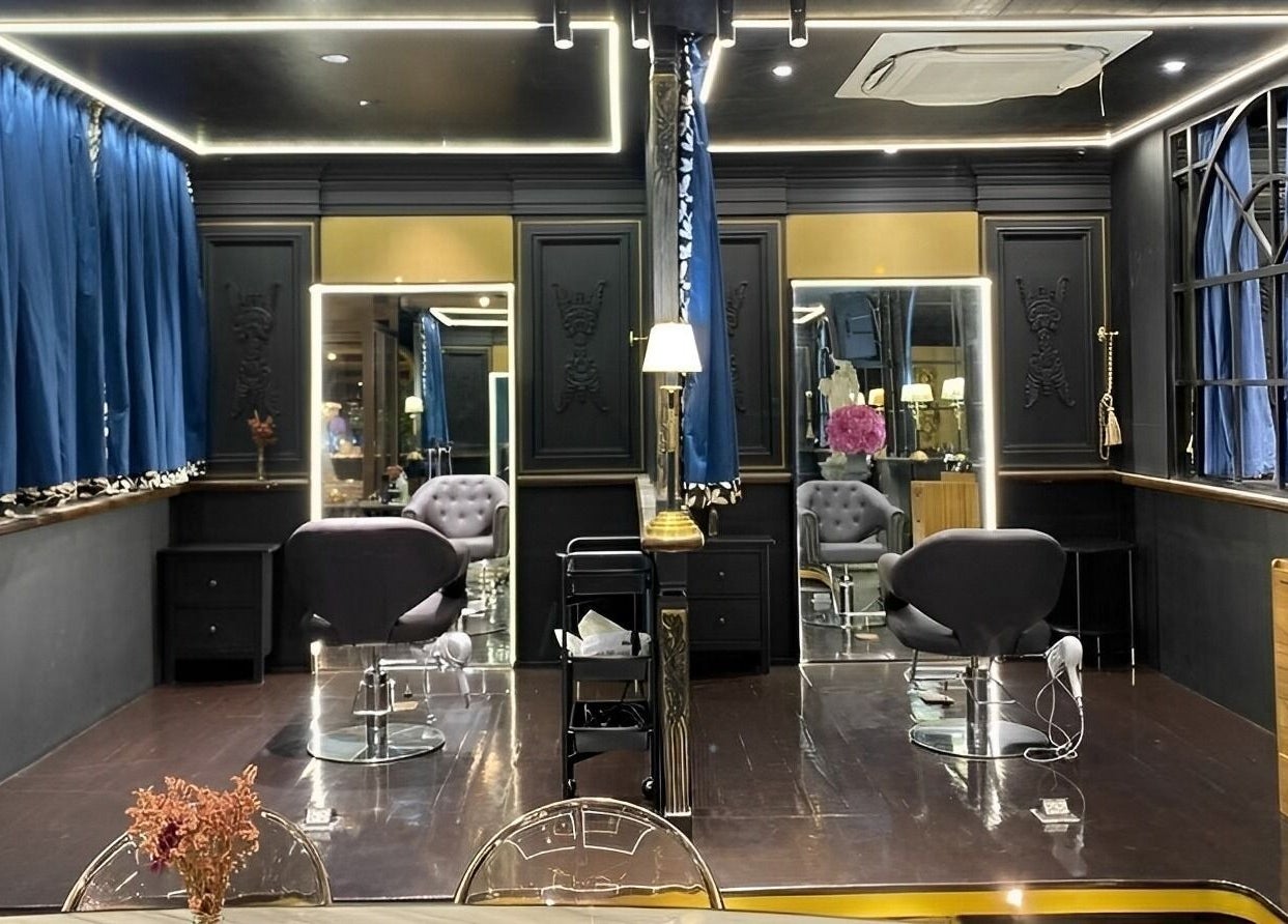 Exclusive salon styling area at Daol Salon Malate, Manila, Metro Manila, PH with plush chairs and chic decor.