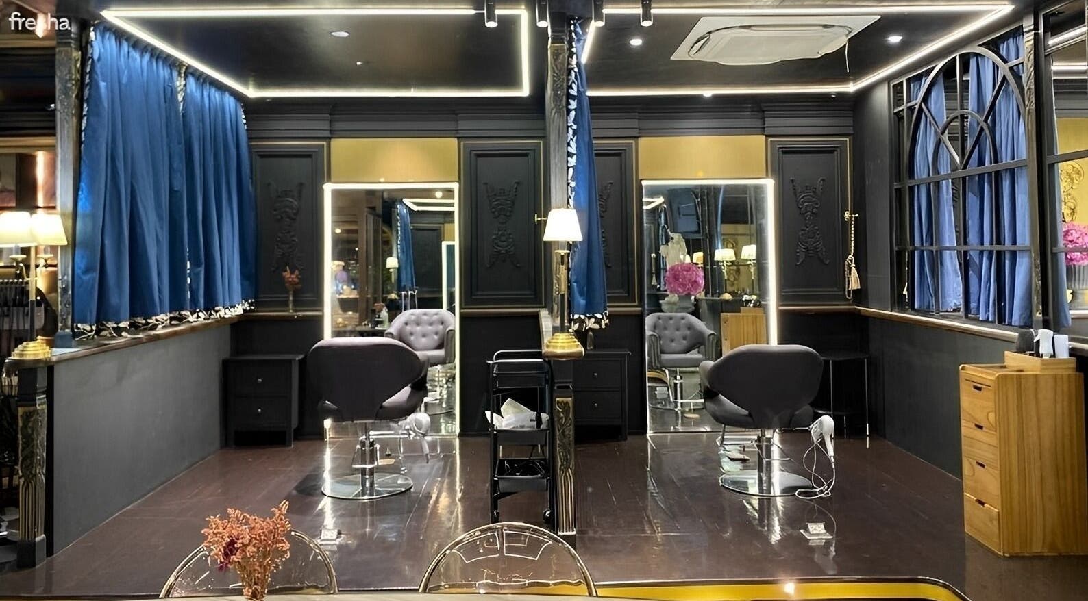 Exclusive salon styling area at Daol Salon Malate, Manila, Metro Manila, PH with plush chairs and chic decor.