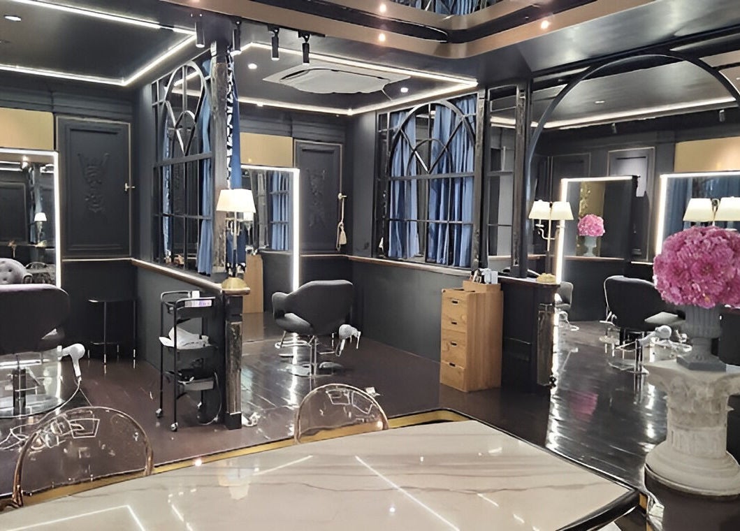 Stylish interior of Daol Salon Malate, Manila, Metro Manila, PH, featuring luxurious decor and seating.