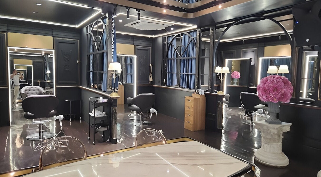 Stylish interior of Daol Salon Malate, Manila, Metro Manila, PH, featuring luxurious decor and seating.