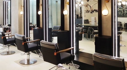 Modern interior of Daol Salon - BGC in Taguig, Metro Manila, PH showcasing stylish salon chairs and mirrors.
