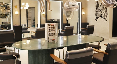 Modern interior of Daol Salon - BGC in Taguig, Metro Manila, PH showcasing sleek salon chairs and stylish decor.