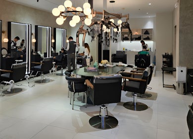 Contemporary interior of Daol Salon - BGC in Taguig, Metro Manila, PH, featuring stylish chairs and lighting.