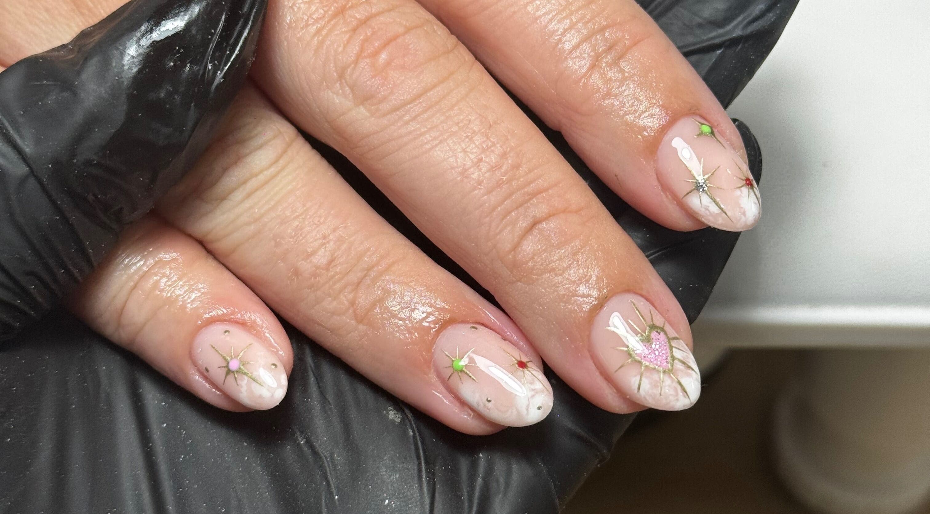Elegant nail art at Chloe’s Beauty Spot, Torquay, England, GB featuring intricate designs and glossy finish.