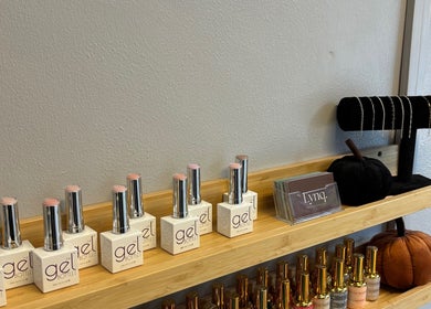 Elegant gel nail products and jewel display at Beauty Mi, Sunbury-on-thames, England, GB.