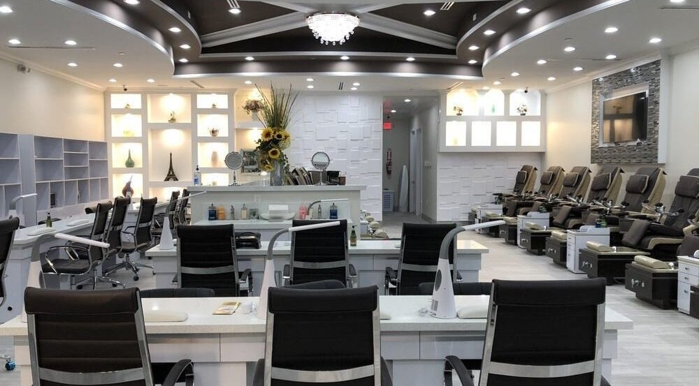 Elegant interior of D'Luxe Nail-Ocotillo in Chandler, Arizona, US, showcasing chic modern pedicure stations.