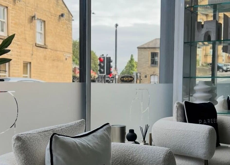 Chic interior of Lush nails by Leah in Leeds, England, GB, showcasing cozy seating and elegant decor.