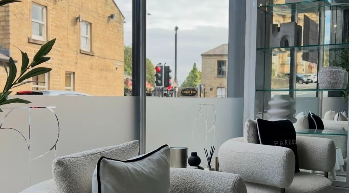 Chic interior of Lush nails by Leah in Leeds, England, GB, showcasing cozy seating and elegant decor.