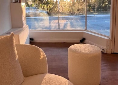 Inviting lounge area at Orange Health Collective, North Bondi, New South Wales, AU, with cozy seating.