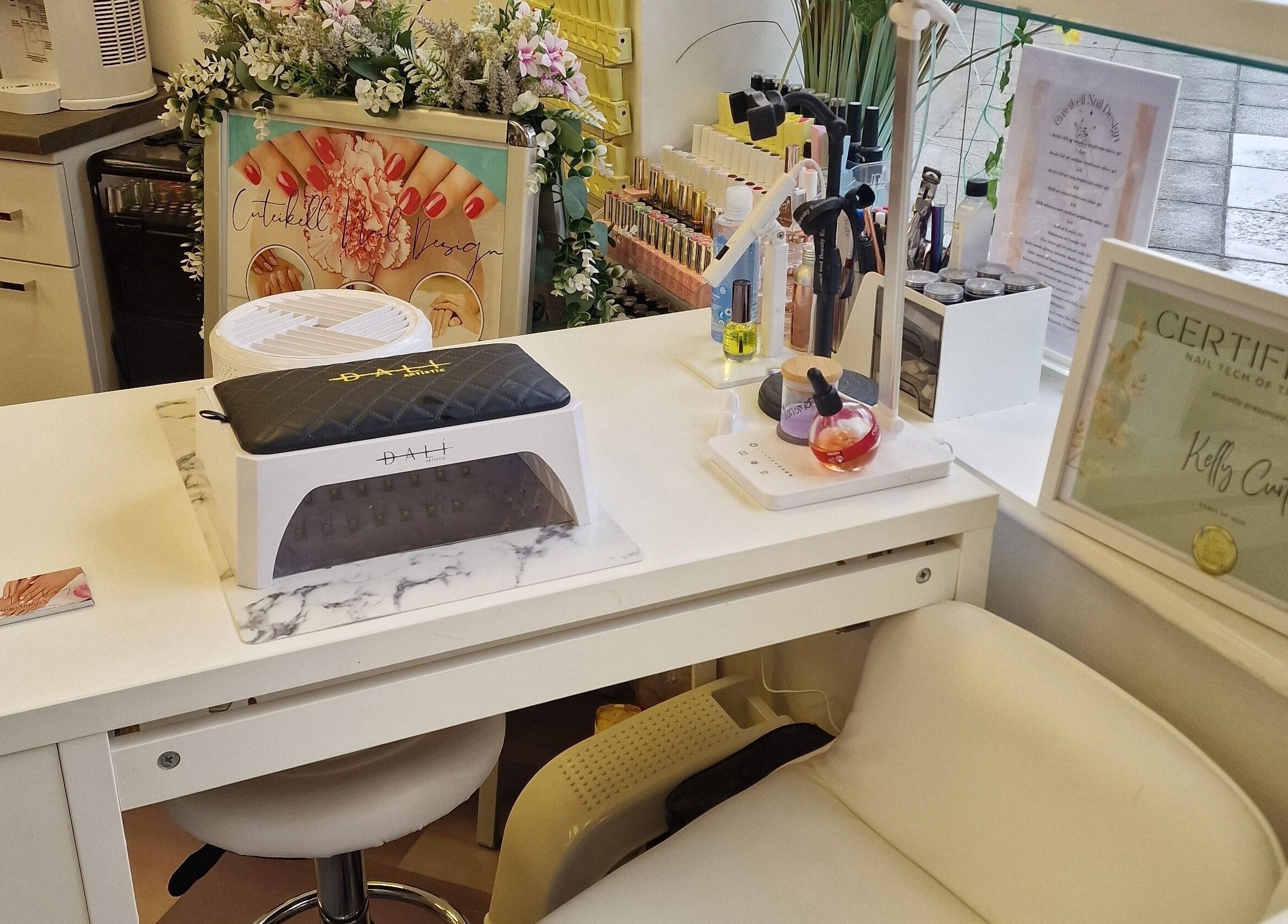 Chic nail station at Cuteikell Nail Design, Plympton, England, GB showcasing tools and decor.