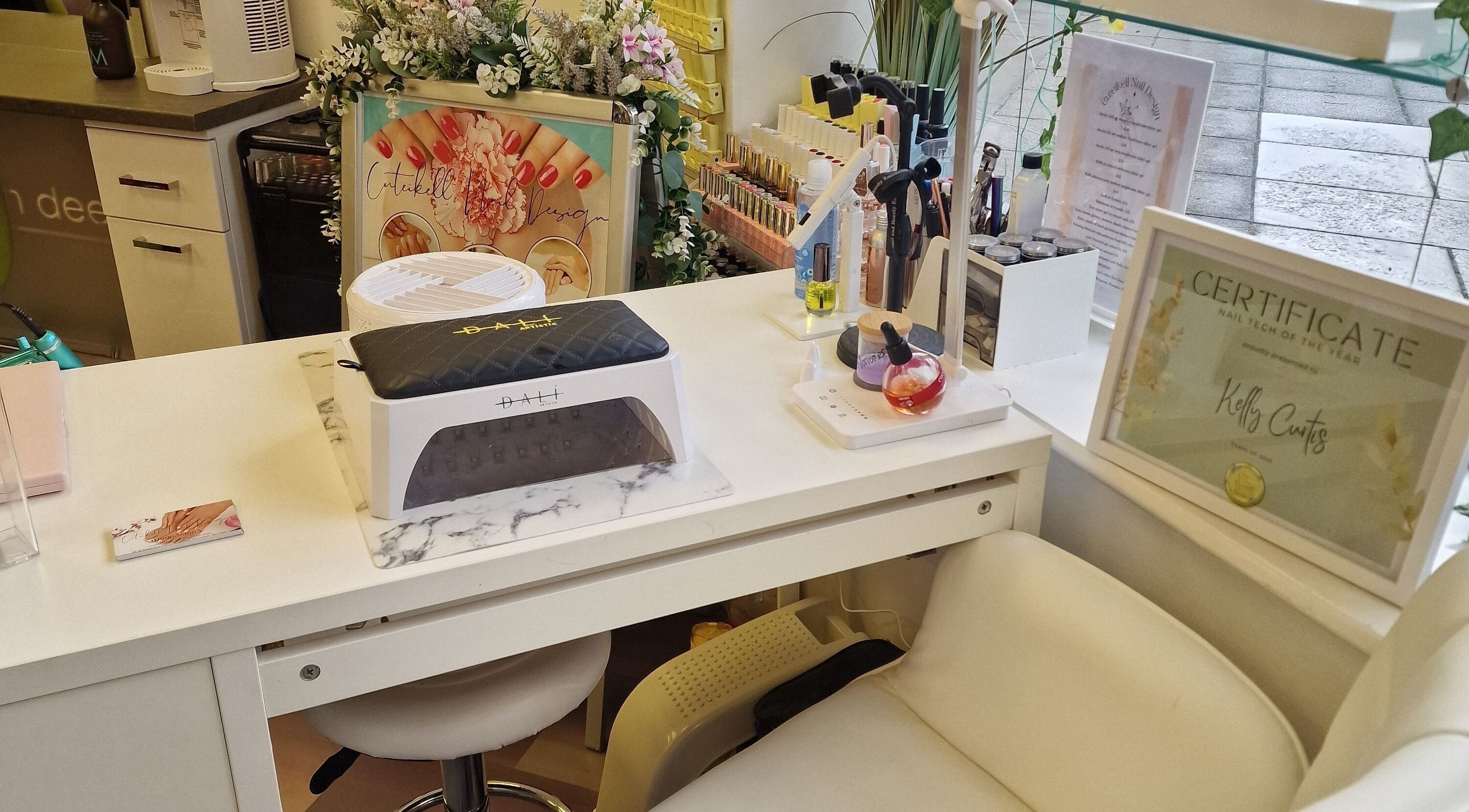 Chic nail station at Cuteikell Nail Design, Plympton, England, GB showcasing tools and decor.