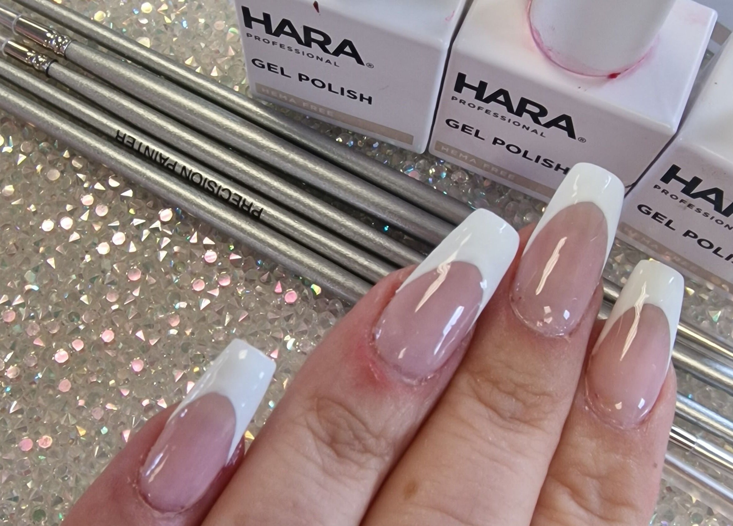 Elegant French manicure at Cuteikell nail design, Plympton, England, GB with Hara gel polish.