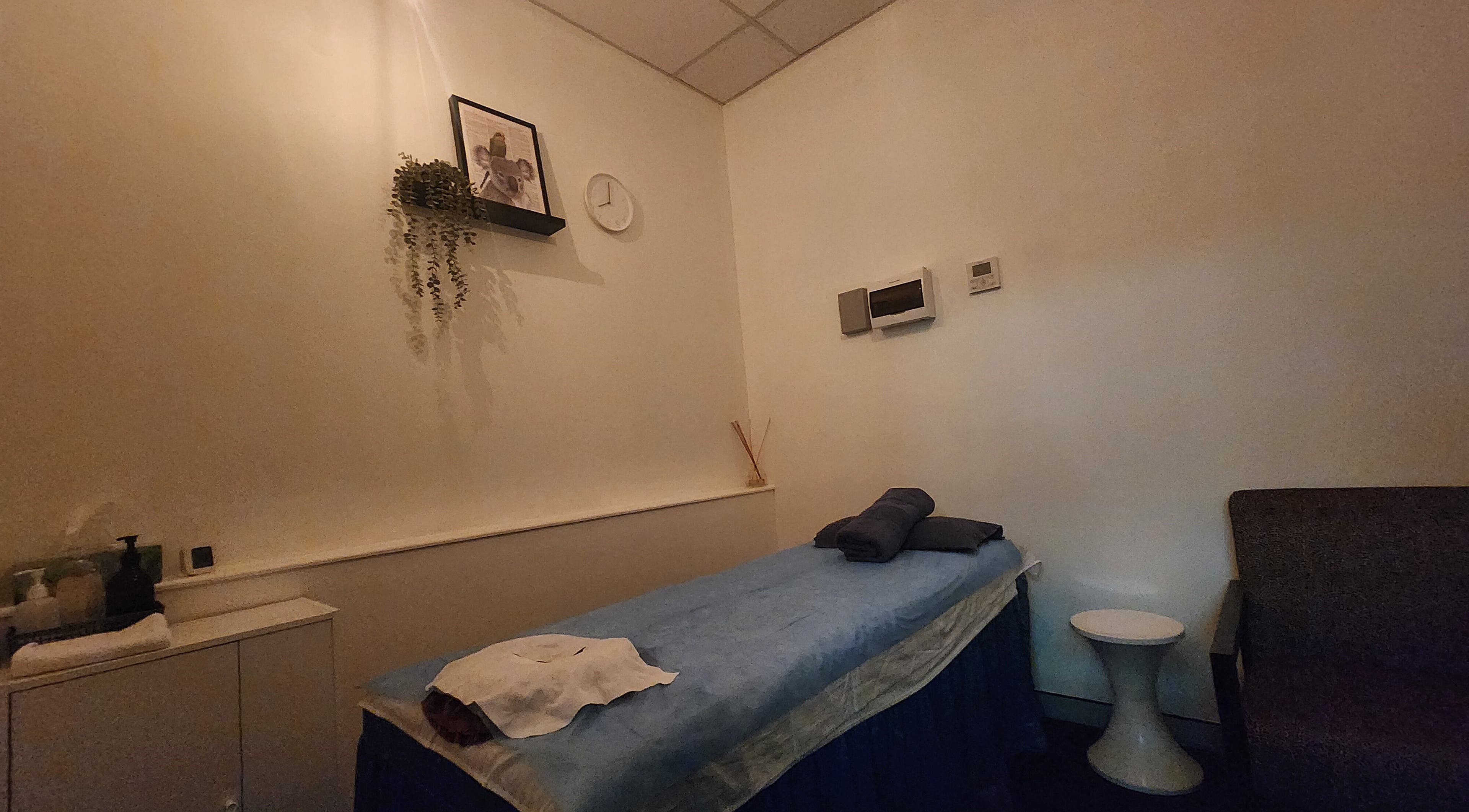 Relaxing massage room at G'Day Massage Perth, Perth, Western Australia, AU. Calm ambiance with warm lighting and decor.