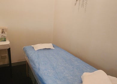 Tranquil massage room at G'Day Massage Perth, located in Perth, Western Australia, AU. Cozy and inviting ambiance.