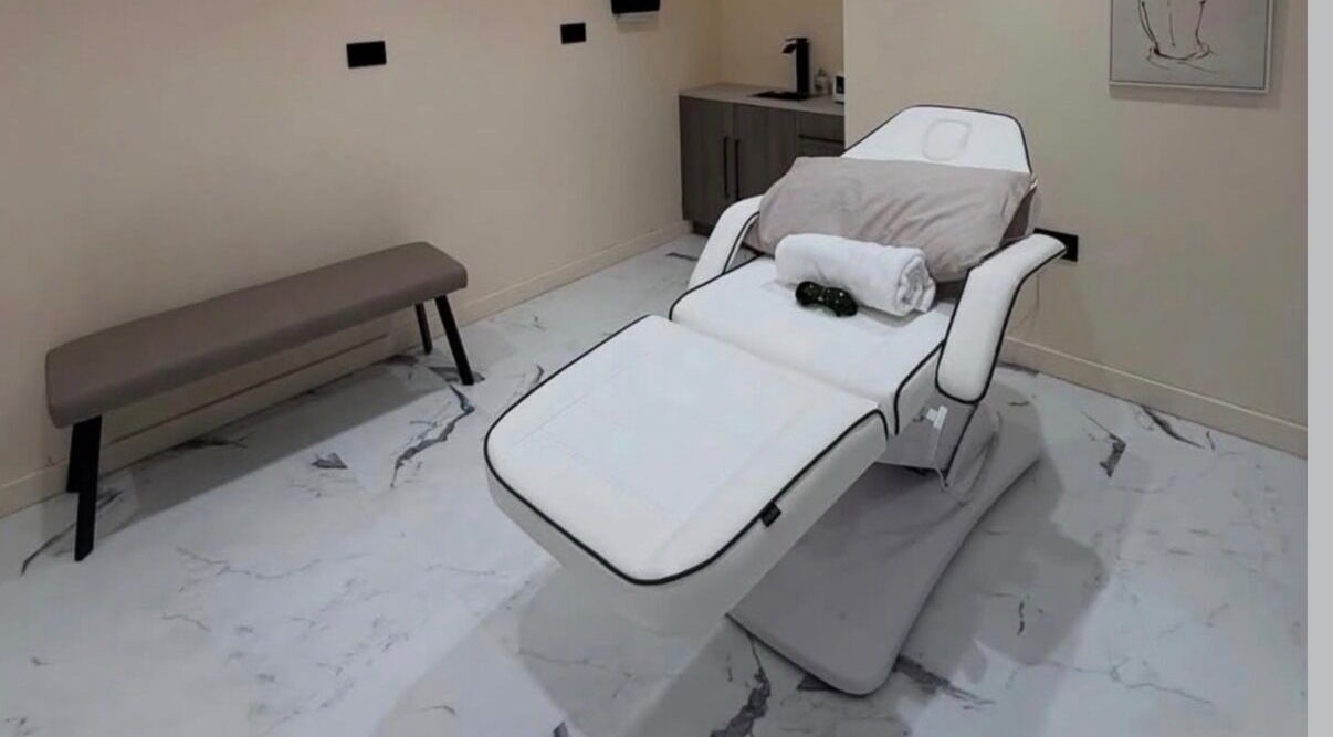 Luxurious treatment bed at Laser Lounge, Ramsbottom, England, GB, offering a serene and relaxing wellness experience.