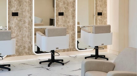 Modern salon chairs and mirrors at Laser Lounge, Ramsbottom, England, GB. Perfect blend of style and comfort.