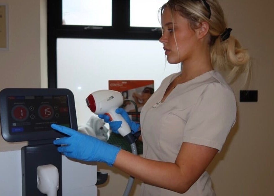 Laser treatment session at Laser Lounge in Ramsbottom, England. Advanced skincare for rejuvenation.