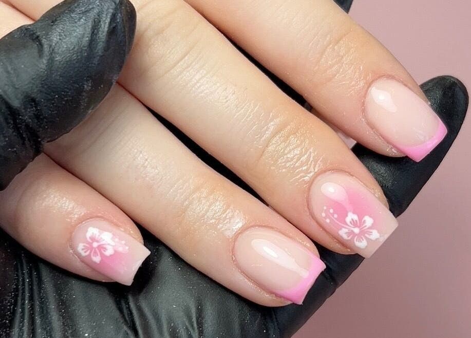 Elegant pink floral nail art at Nails by Chloe, Harrogate, England, GB, showcasing creativity and style.