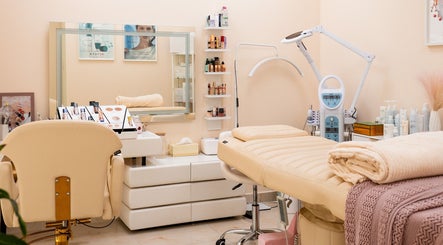 Elegant spa room with treatment bed at Aphrodite Beauty & Spa, Abu Dhabi, Abu Dhabi, AE, showcasing luxury and comfort.