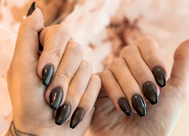 Elegant dark nails at Aphrodite Beauty & Spa, Abu Dhabi, Abu Dhabi, AE, showcasing meticulous craftsmanship.